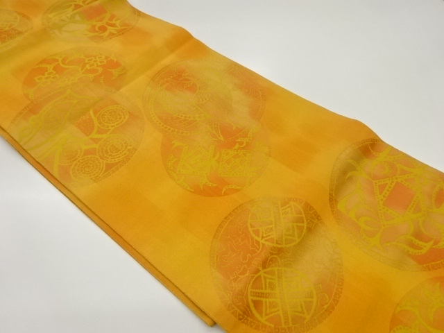 丸文に鳥・抽象模様織出し名古屋帯